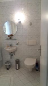 Ένα μπάνιο στο Ferienwohnung Hegenauer