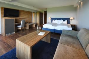Postel nebo postele na pokoji v ubytování Hotel Rebenhof