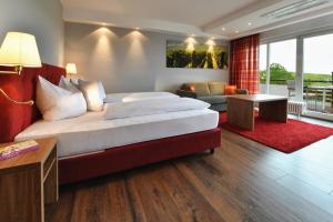 Postel nebo postele na pokoji v ubytování Hotel Rebenhof