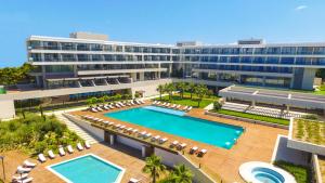 an aerial view of a hotel with a swimming pool at ON'LIVE HOTEL in Çeşme