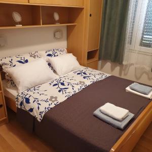 Posteľ alebo postele v izbe v ubytovaní Apartments Marijan