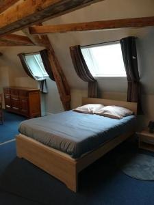 Ліжко або ліжка в номері Manoir de Bolbec