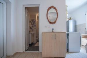 Koupelna v ubytování Apartmani Dačo + 37 fotografií