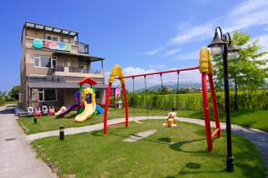 Zona de juegos para niños en Playful Paradise