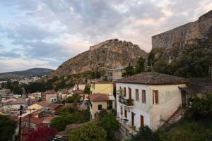 a view of a town with a mountain at Rodi Retro in Nafplio