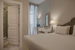 
Cama o camas de una habitación en Micra Anglia Boutique Hotel & Spa
