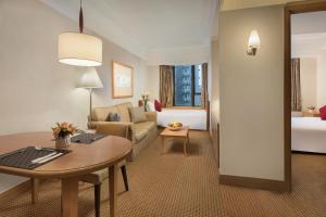 Postelja oz. postelje v sobi nastanitve Ramada Hong Kong Grand View
