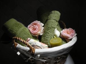 a basket filled with flowers and stuffed animals at B&B Casacapraia in Itri