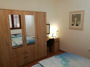 Postel nebo postele na pokoji v ubytování Casa Val Madorso