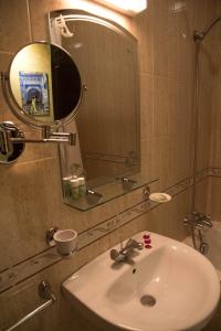 Koupelna v ubytování Amani Hotel Suites & Spa