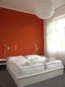Postelja oz. postelje v sobi nastanitve Hotel Saloon