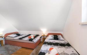 Ένα ή περισσότερα κρεβάτια σε δωμάτιο στο Elizabeta Holiday Home