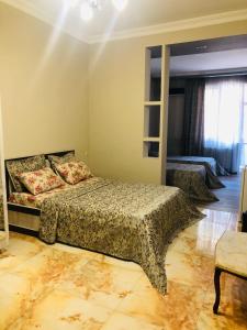 Postel nebo postele na pokoji v ubytování hotel Pharnavaz