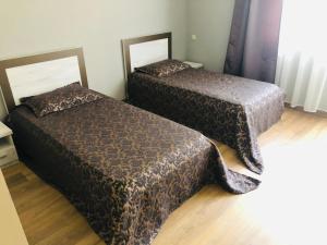 Postel nebo postele na pokoji v ubytování hotel Pharnavaz