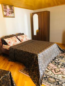 Postel nebo postele na pokoji v ubytování hotel Pharnavaz