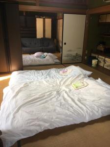 Postel nebo postele na pokoji v ubytování Guest House Ilonggo