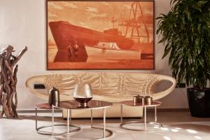 A seating area at Myconian Naia - Preferred Hotels & Resorts