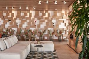 A seating area at Myconian Naia - Preferred Hotels & Resorts