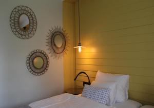 Säng eller sängar i ett rum på Nynäs Havsbad