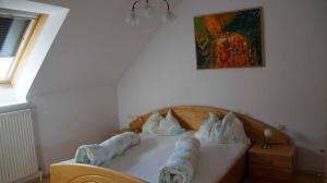 Кровать или кровати в номере Weinbau und Gästezimmer Pammer
