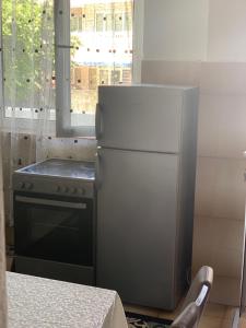 Kuchyň nebo kuchyňský kout v ubytování Apartments Dibra + 10 fotografií