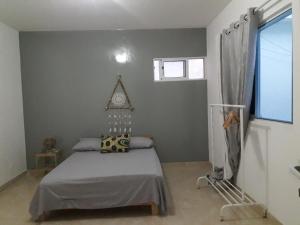 Letto o letti in una camera di Meeting Point- Tarrafal Center, also in Praia & Fogo-NO CASH ACCEPTED