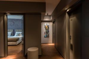 Postel nebo postele na pokoji v ubytování Hotel Mrak