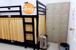 Postel nebo postele na pokoji v ubytování Sindy's Hostel