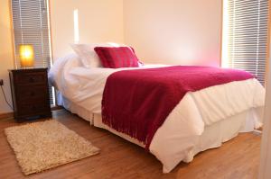 Letto o letti in una camera di Apart Hotel Quillango