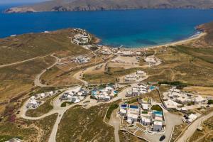 an aerial view of a village next to the ocean at Mykonos Panormos Villas in Mykonos