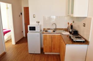 Cucina o angolo cottura di Apart Hotel Quillango