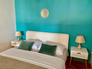 Postel nebo postele na pokoji v ubytování Deluxe Suites Mandić