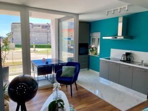 Kuchyň nebo kuchyňský kout v ubytování Deluxe Suites Mandić