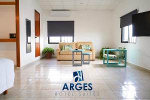 TV a/nebo společenská místnost v ubytování Hotel & Suites Arges - Centro Chetumal