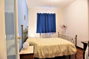 Postel nebo postele na pokoji v ubytování Il Paradiso dei nidi