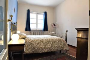 Postel nebo postele na pokoji v ubytování Il Paradiso dei nidi