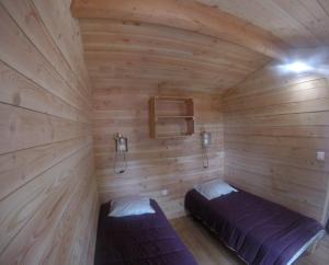Postel nebo postele na pokoji v ubytování Camping la Simioune en Provence