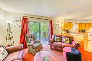 a living room with leather furniture and a kitchen at Franconia's Far Far Away in Franconia