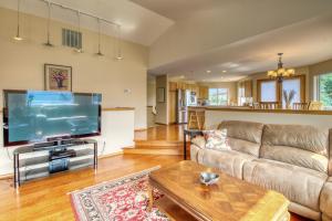 a living room with a large flat screen tv at The Hawks Nest in Manson