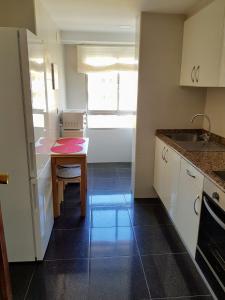 Kuchyňa alebo kuchynka v ubytovaní Fantástico apartamento en la playa