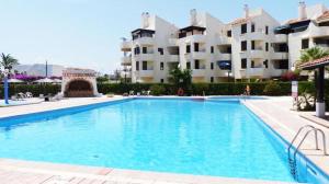Bazén v ubytovaní Apartamento en Denia alebo v jeho blízkosti