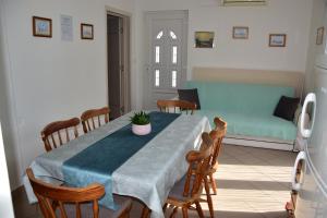 Postel nebo postele na pokoji v ubytování Apartmani Novosel