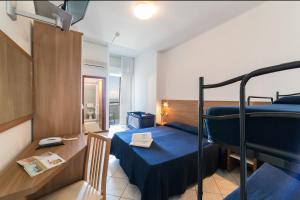 Postel nebo postele na pokoji v ubytování Hotel Promenade