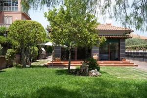 Vonkajšia záhrada v ubytovaní La casa di Masina - A surrounded garden Villa -
