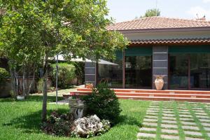 Vonkajšia záhrada v ubytovaní La casa di Masina - A surrounded garden Villa -