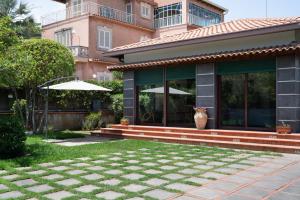 Vonkajšia záhrada v ubytovaní La casa di Masina - A surrounded garden Villa -