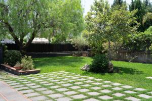Vonkajšia záhrada v ubytovaní La casa di Masina - A surrounded garden Villa -