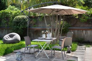 Vonkajšia záhrada v ubytovaní La casa di Masina - A surrounded garden Villa -