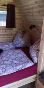 Tempat tidur dalam kamar di Casa Benefizium