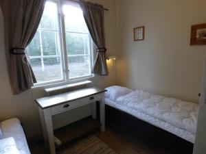 Letto o letti in una camera di Nya Skogsgården Hostel